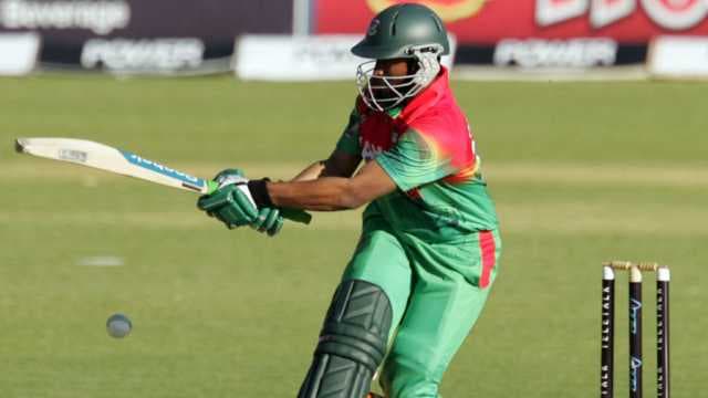 Zimbabwe hold nerve for tense win