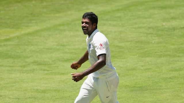 Aaron six-for limits Karnataka to 244