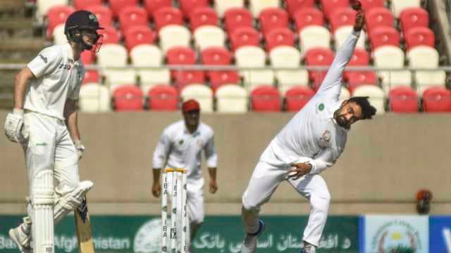 Rashid Khan rises above pain to stall Ireland's resurgence
