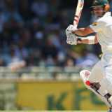Warner kicks them when they're down