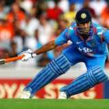 Dhoni out of Asia Cup with side strain