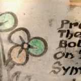 Art at the bus stand, offal on the plate
