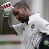 Dhawan falters but Delhi take day's honours