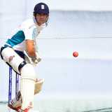 Record-breaking Cook admits tough to leave family