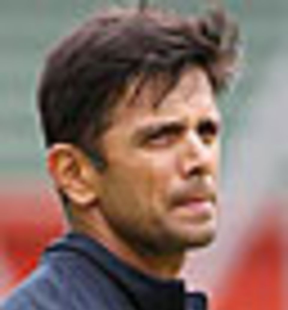 Rahul Dravid drags his kit bag