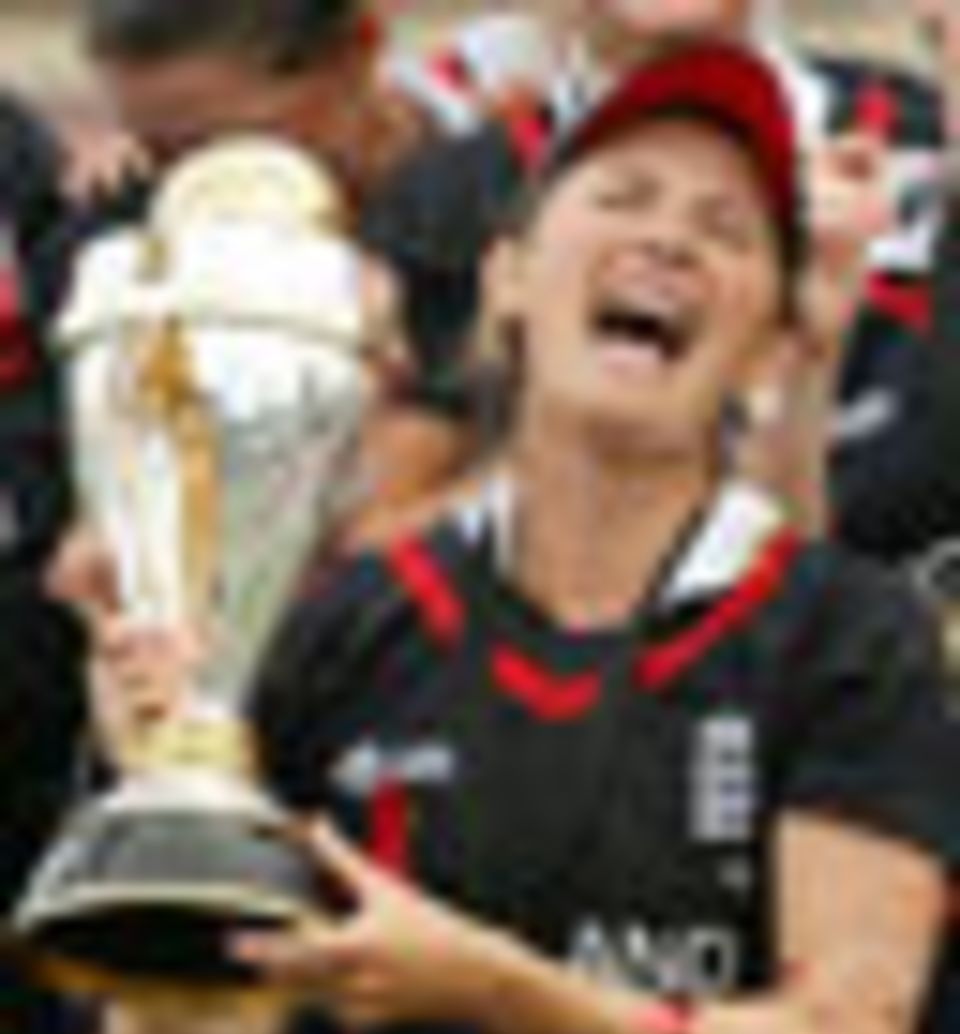 An ecstatic Charlotte Edwards lifts the World Cup