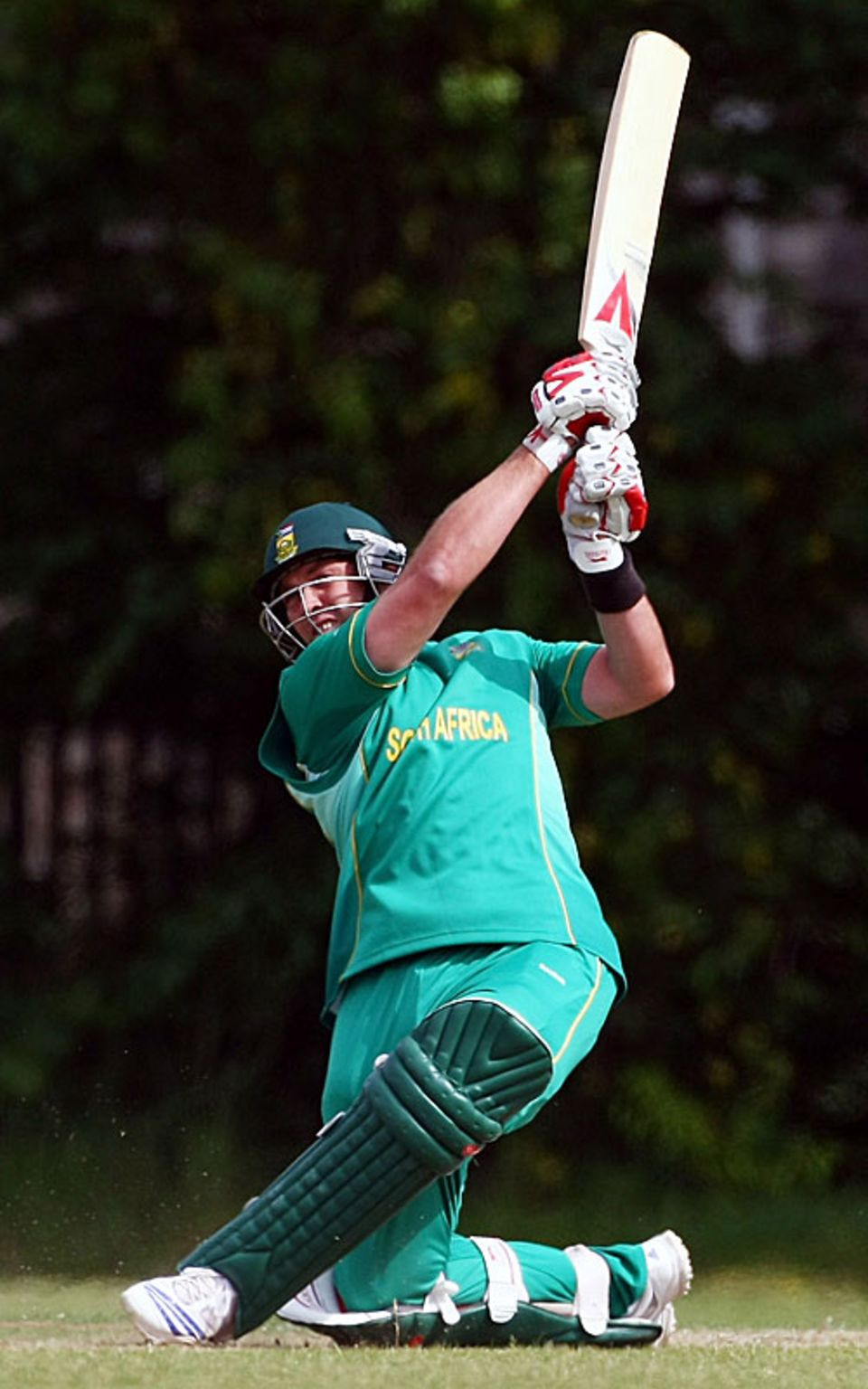 Jacques Kallis powers one away on his knee