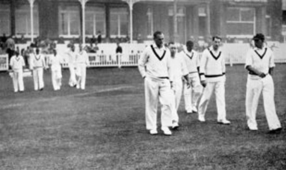 England take the field after enforcing the follow-on