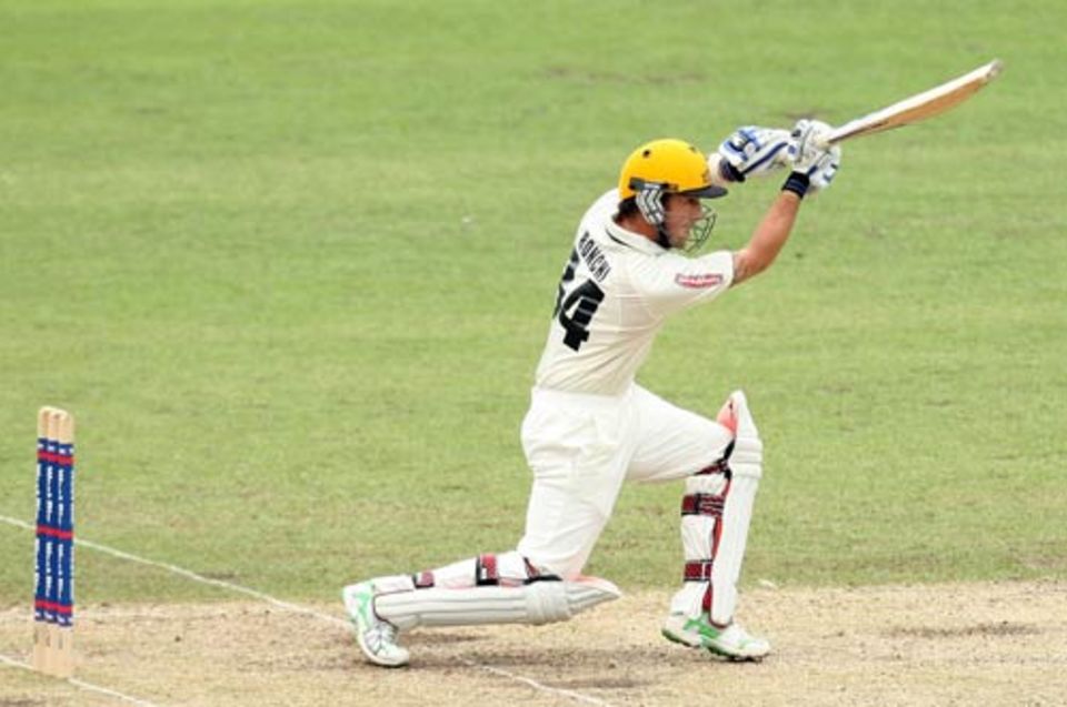 Luke Ronchi drives down the ground