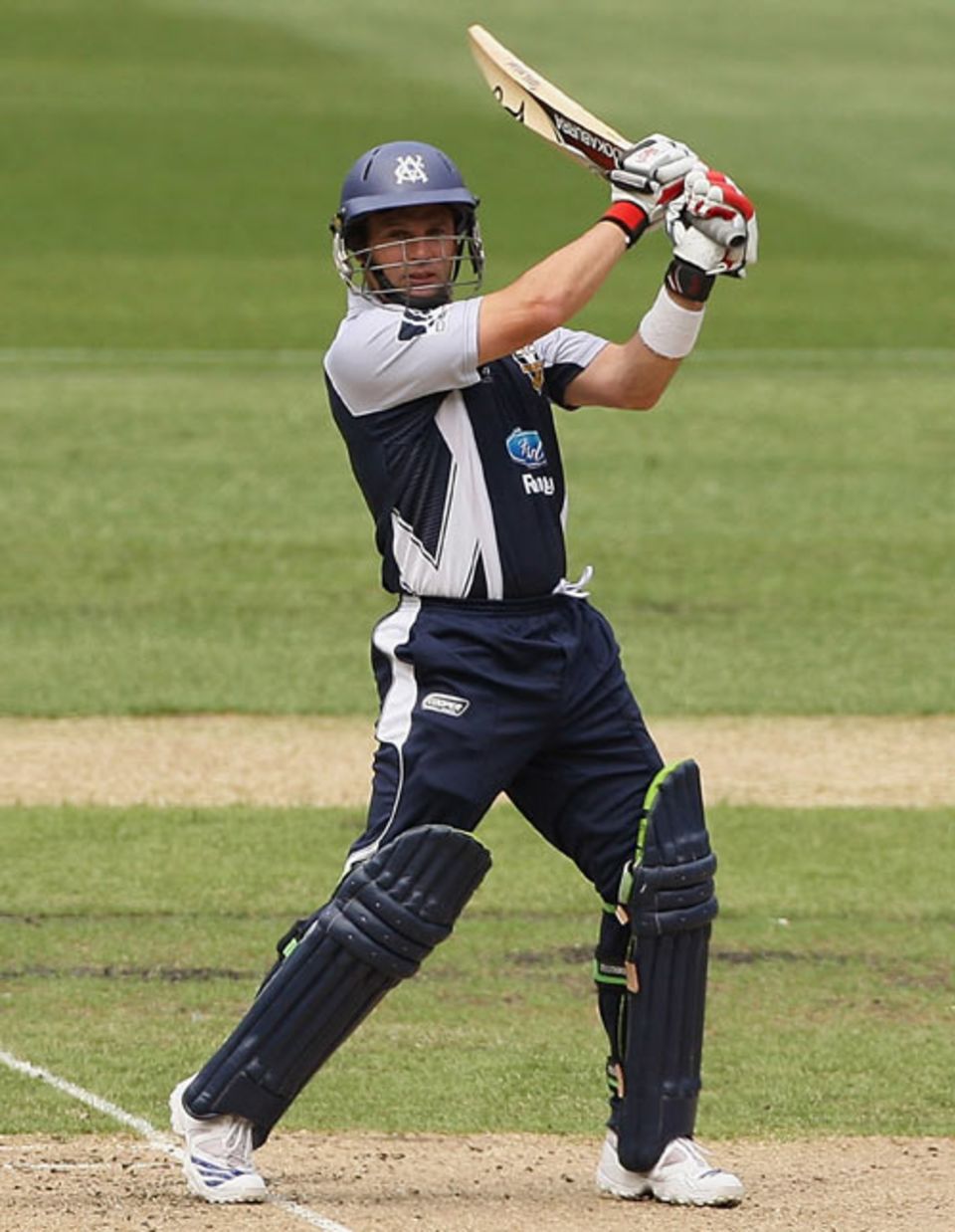 Brad Hodge cracks the ball towards point