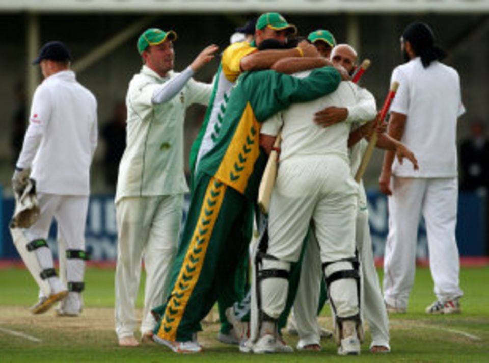 Mobbed by team-mates after leading South Africa to their first Test series win in England in over 40 years