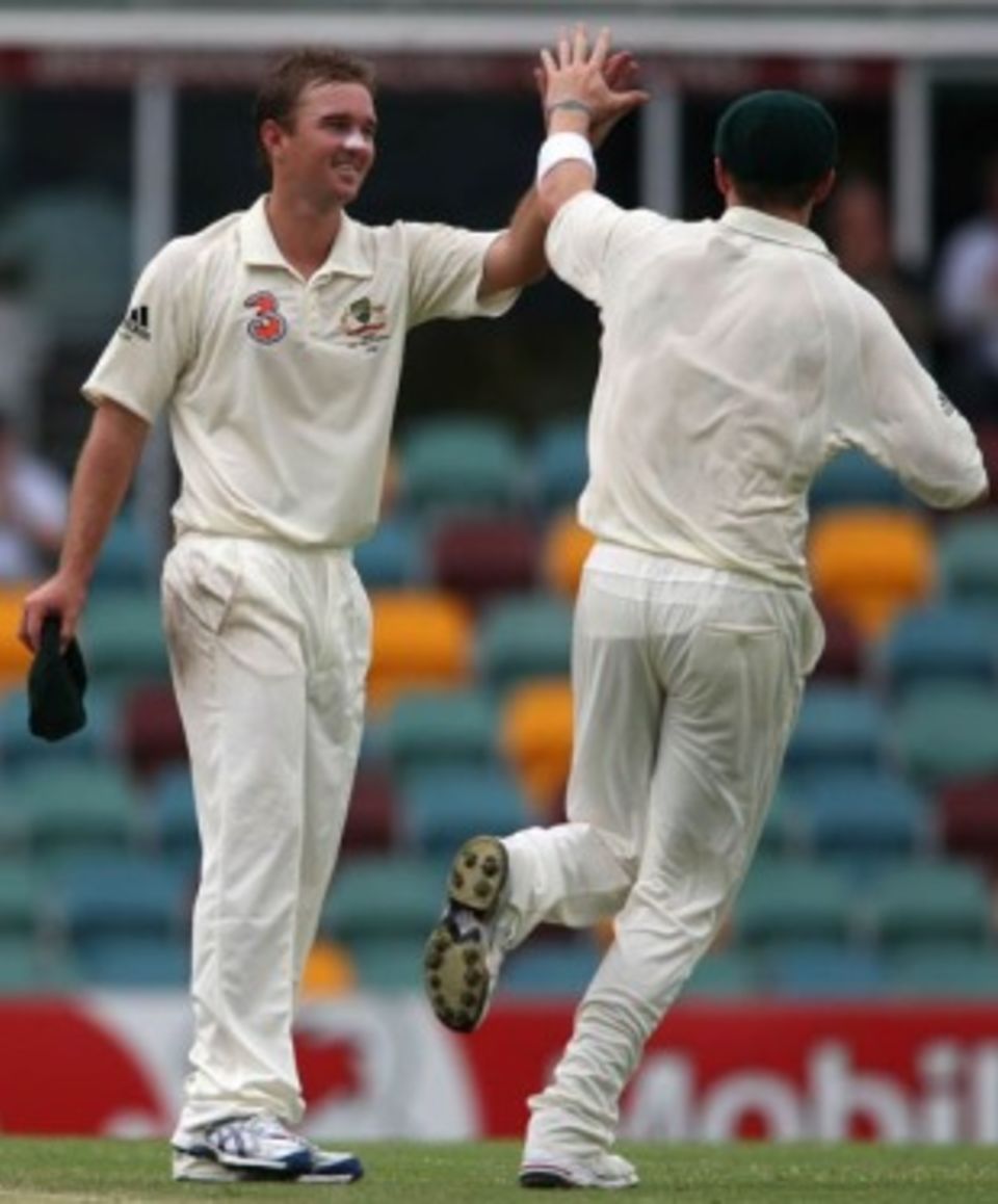 High five: Nathan Hauritz picked up a full hand of wickets at the Gabba