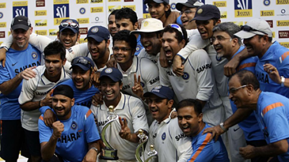 The Indian team and management celebrate going No. 1