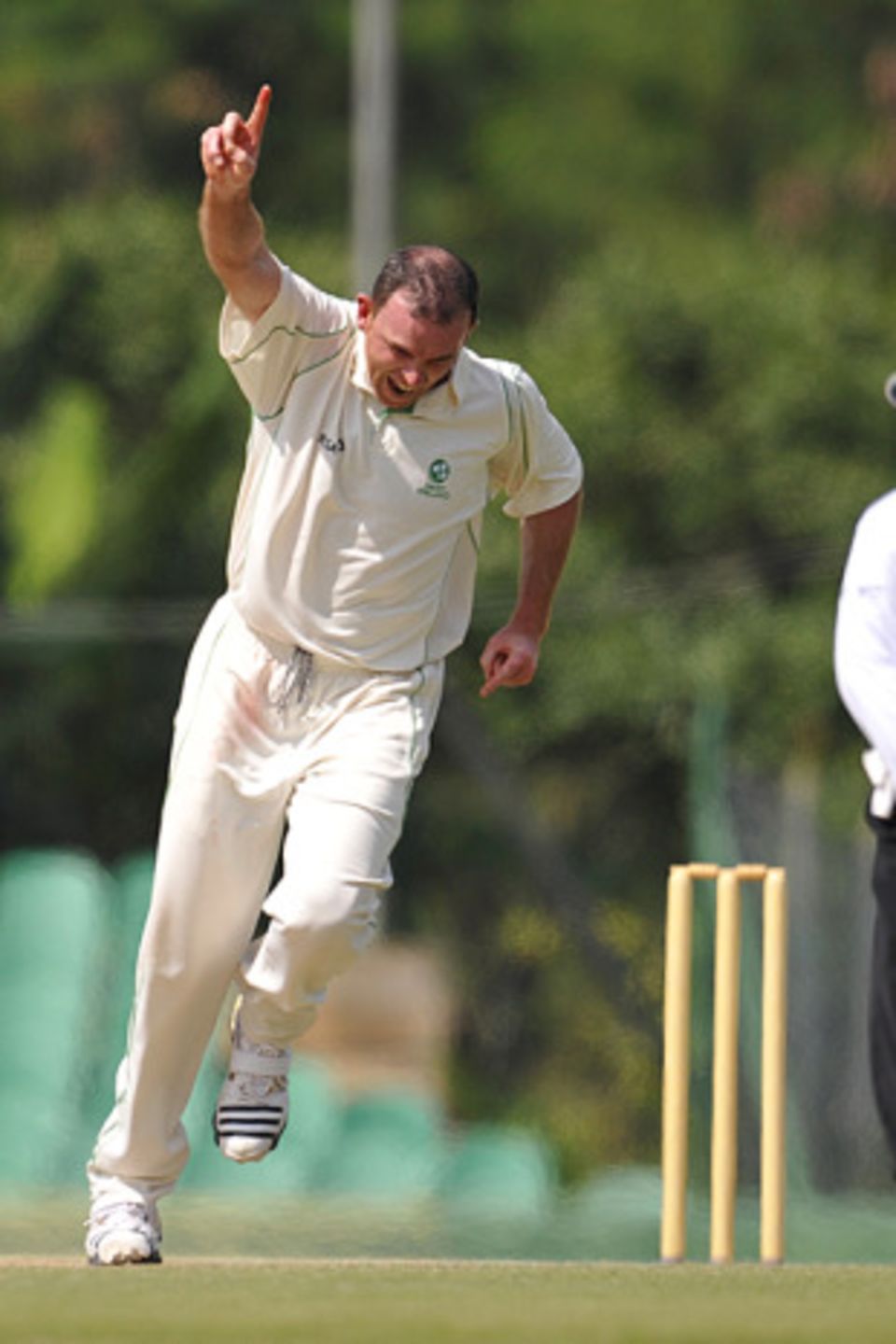 Trent Johnston celebrates Asgher Stanikzai's dismissal on the third day at Dambulla