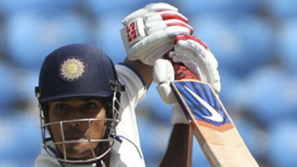 S Badrinath opens the face of the bat