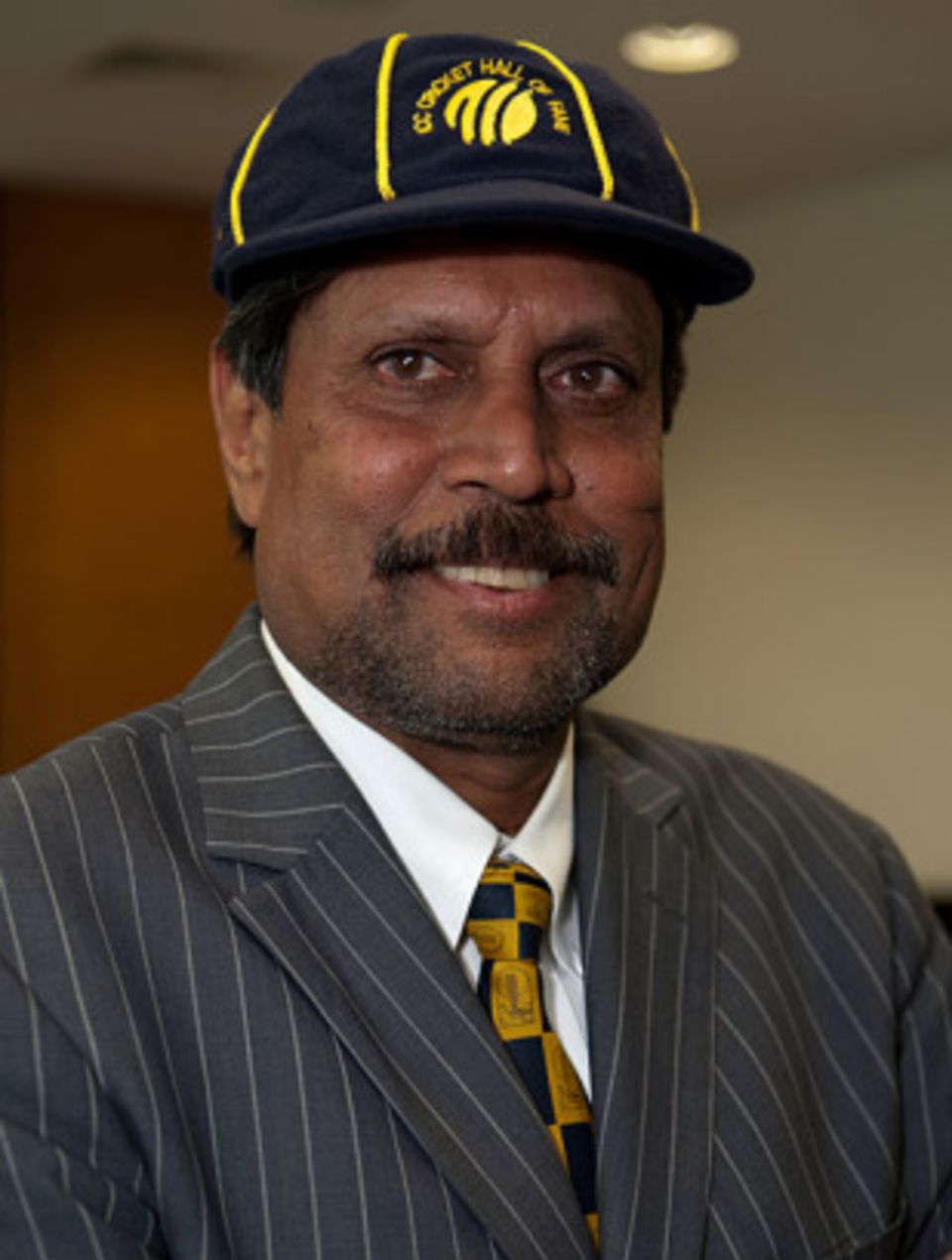 Kapil Dev will only be considered for the one-time benefit if he takes the board's amnesty offer, Rajiv Shukla has said