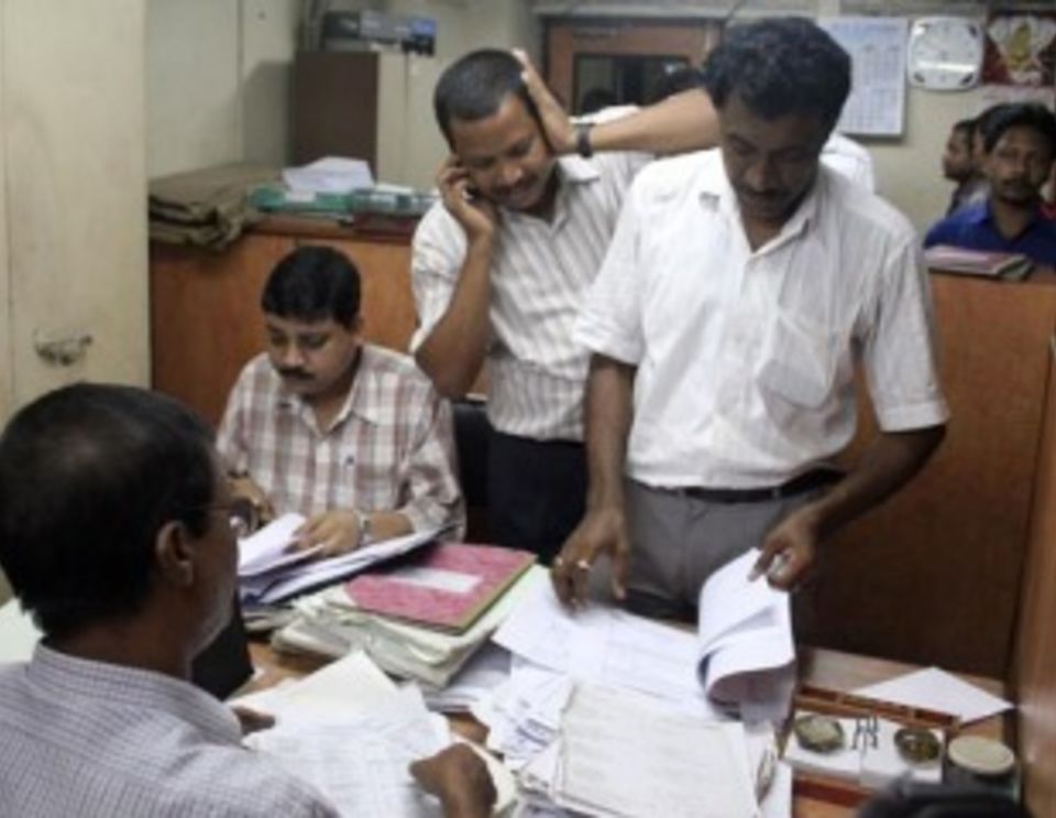 Income tax officials at the Cricket Association of Bengal office