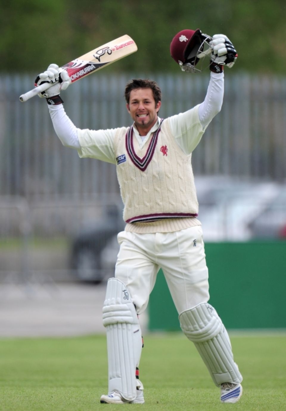 Peter Trego celebrates his hundred against Lancashire