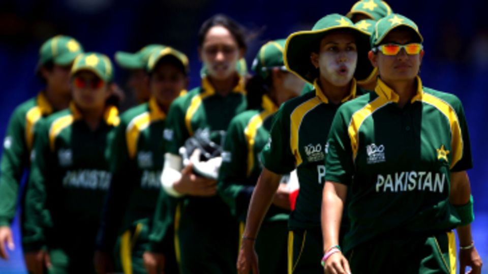 Sana Mir leads her team off the field