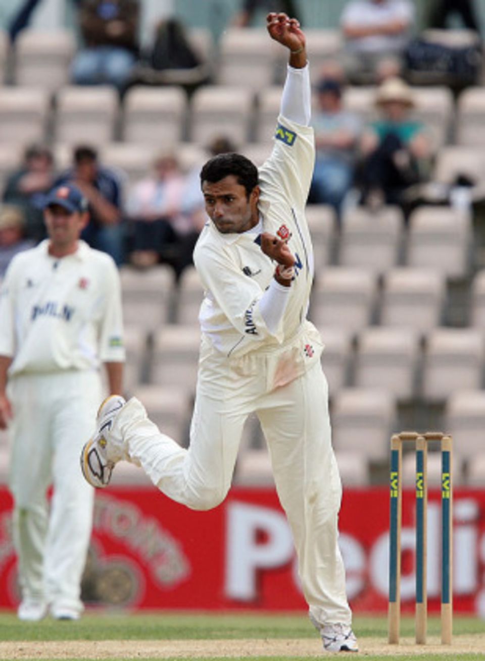 Danish Kaneria will be free to play for Essex and Pakistan unless his is proven guilty of involvement in spot-fixing