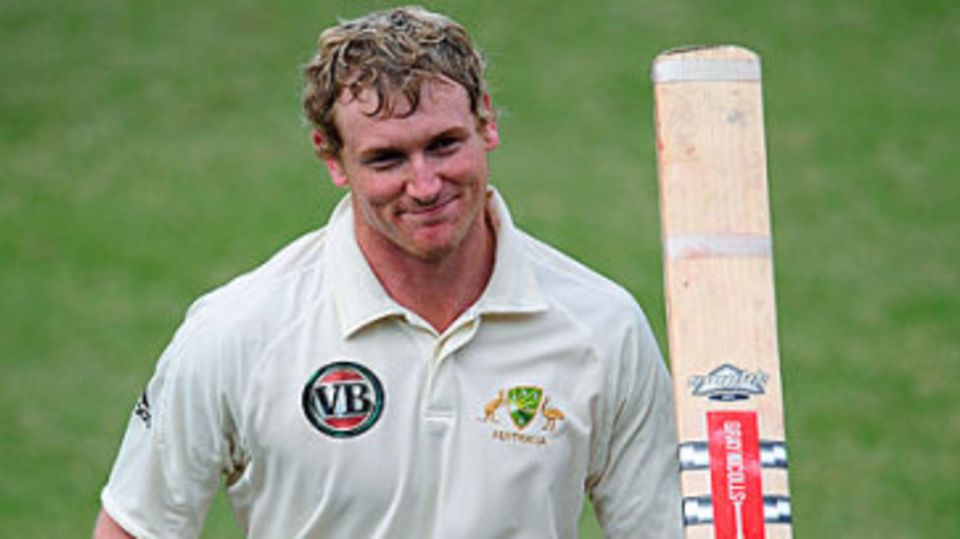 George Bailey walks back after scoring an unbeaten 154