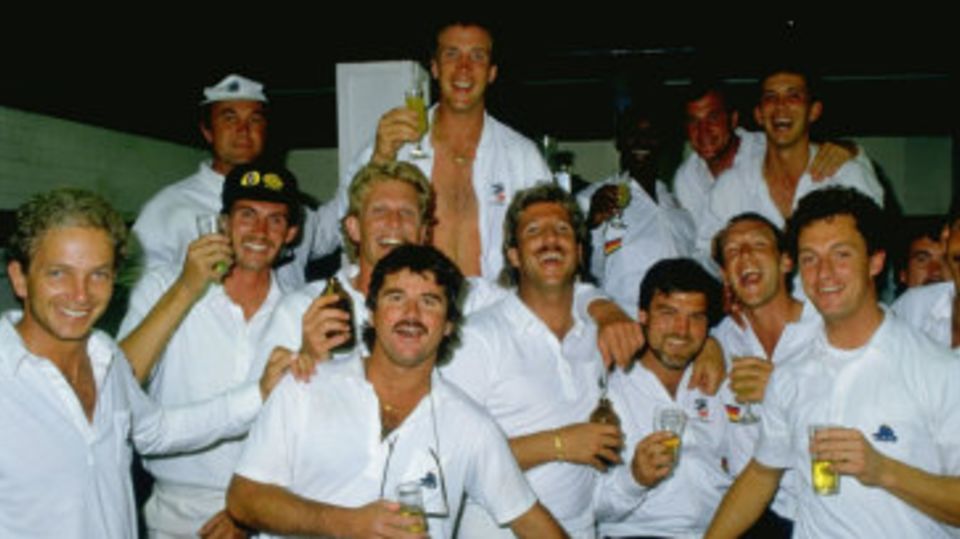 The England squad celebrate after winning the first Ashes Test