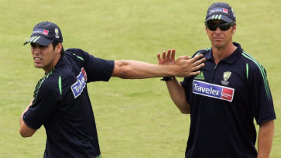 Mitchell Johnson and Troy Cooley at a training session