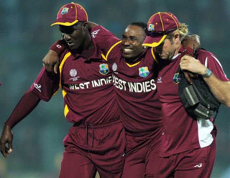 Dwayno Bravo was carried off the pitch after damaging his knee while fielding off his own bowling in the match against South Africa