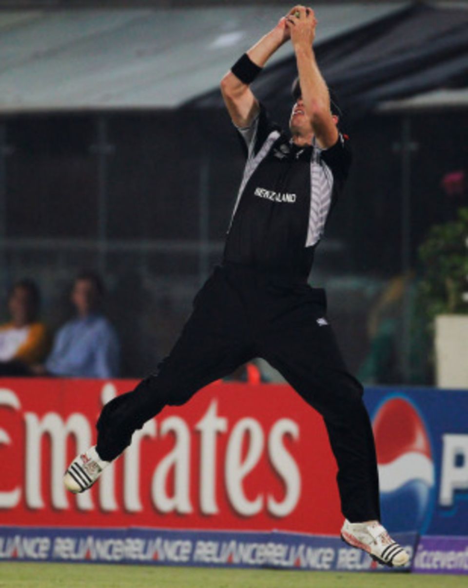 Jacob Oram, 1.98m and leaping further up, takes the catch of the tournament