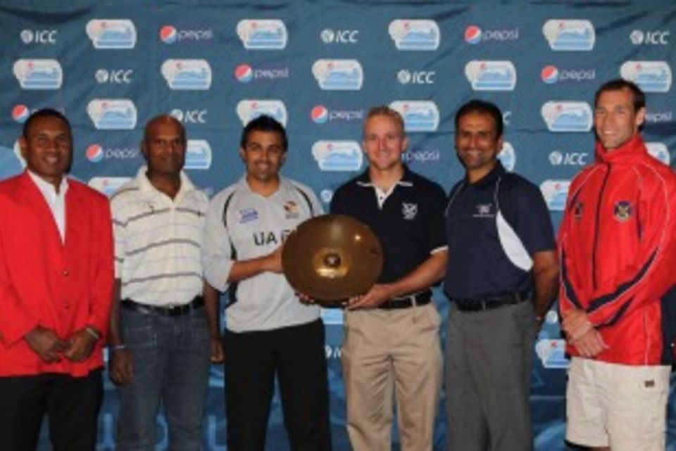 The captains of the six teams pose with the trophy