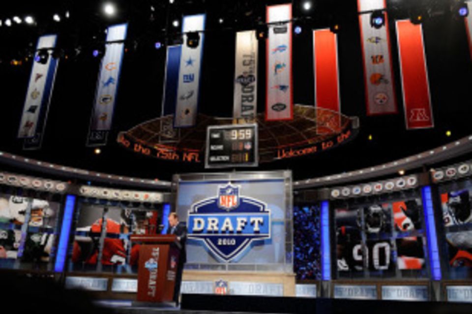 The draft system of pre-determined wages, with performance incentives, works better than an auction because it rewards players more fairly