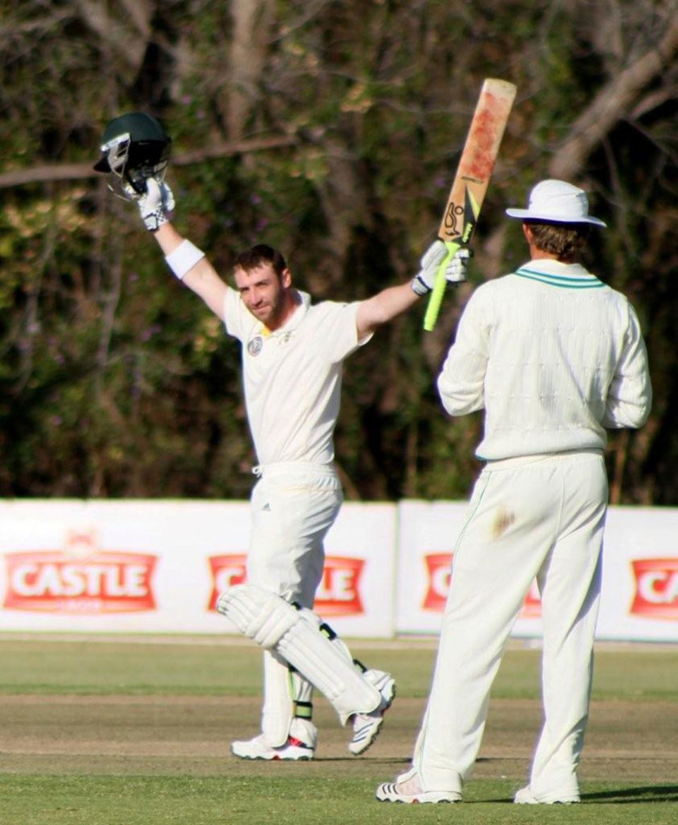 Phillip Hughes acknowledges the spectators' applause after reaching a ton