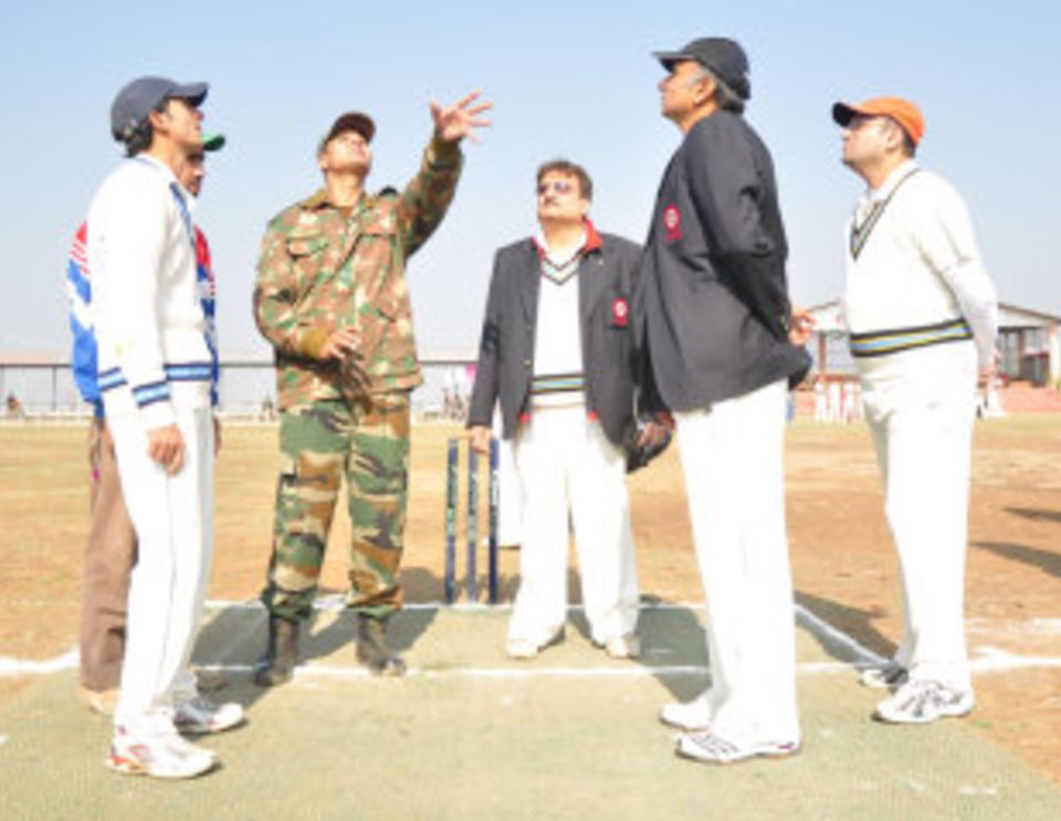 The ever-present army: here, even the toss is controlled by them