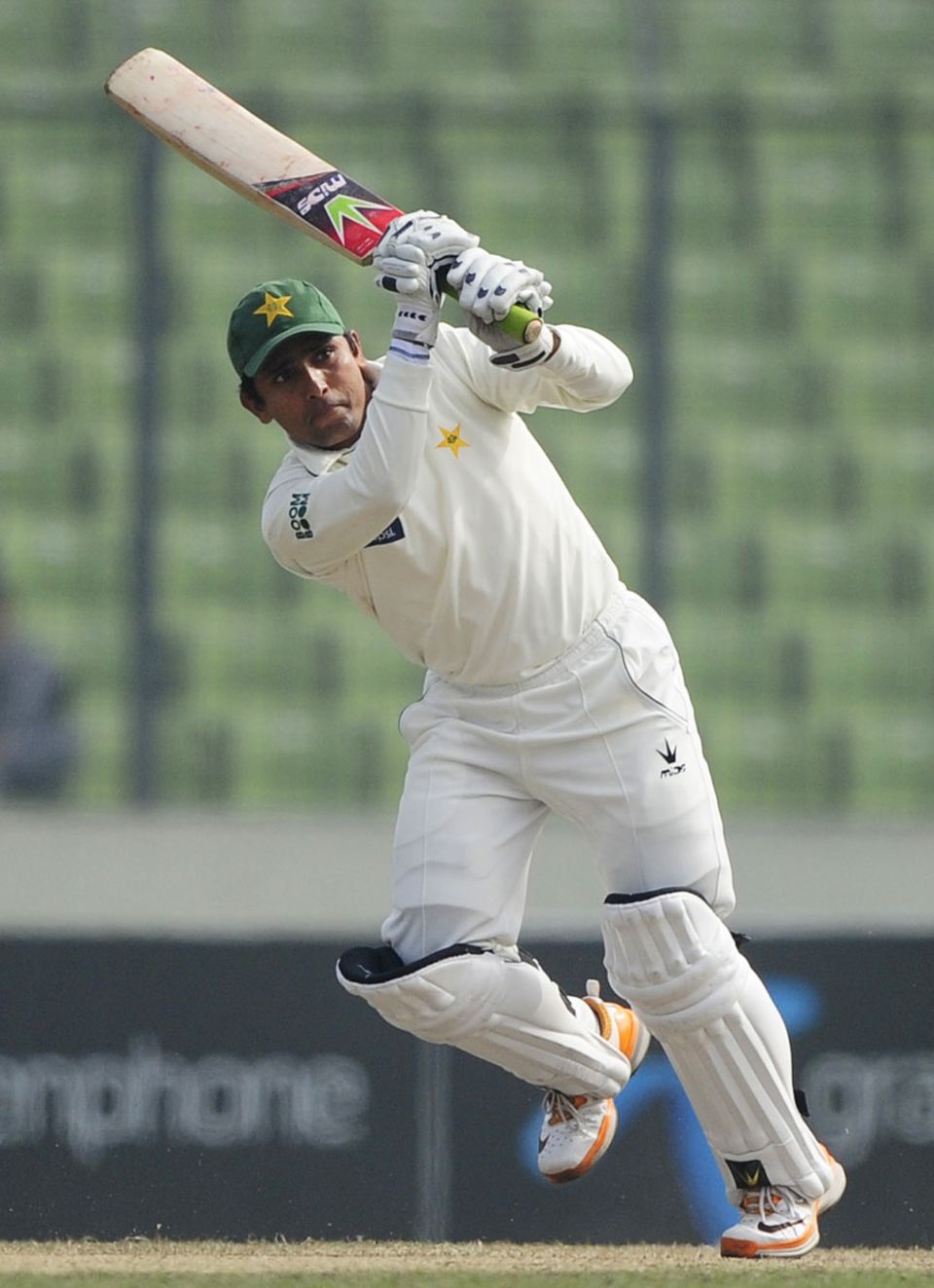 Adnan Akmal whips the ball to the leg side