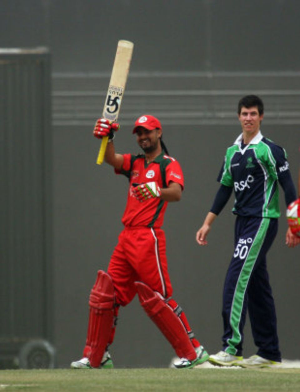 Jatinder Singh carried his bat through Oman's 20 overs for an unbeaten 56 off 55 balls to no avail