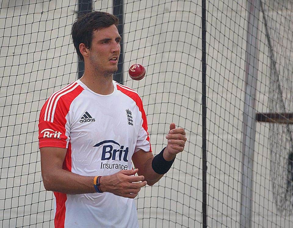 Steven Finn has a bowl in the nets