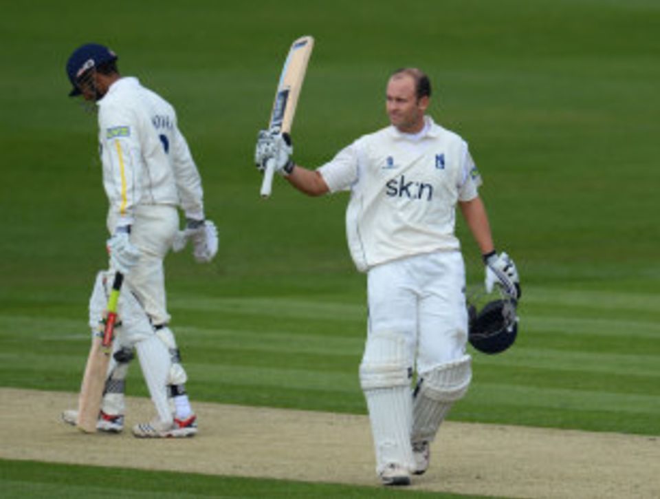 Jonathan Trott made an unbeaten hundred on his first appearance for Warwickshire this season