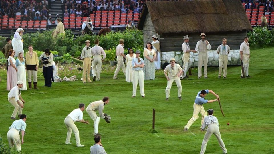 Performers play cricket at the opening ceremony of the 2012 London Olympics