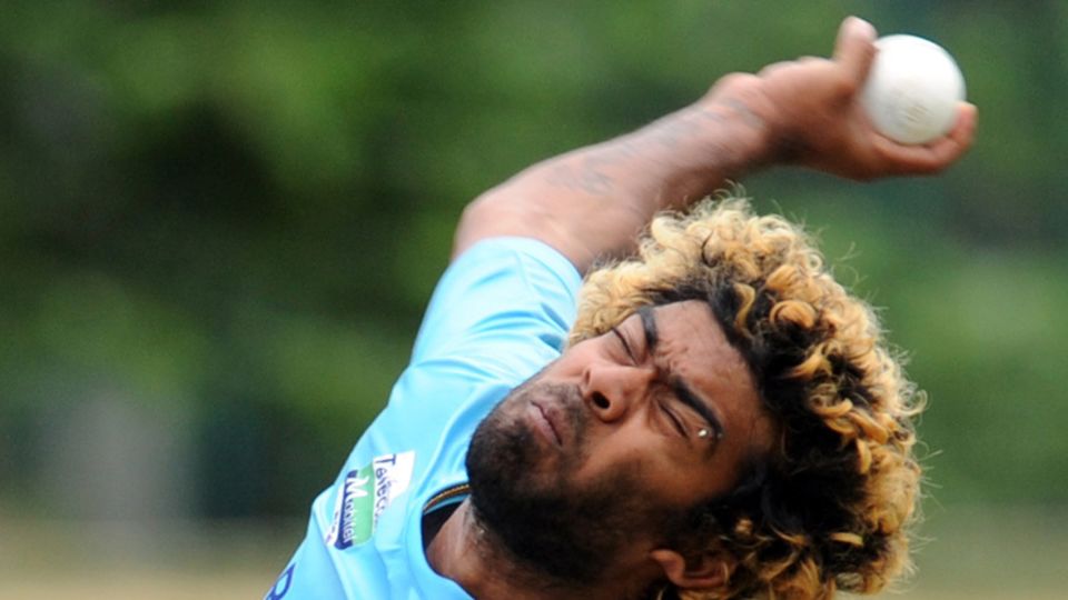 Lasith Malinga bowls in a training session
