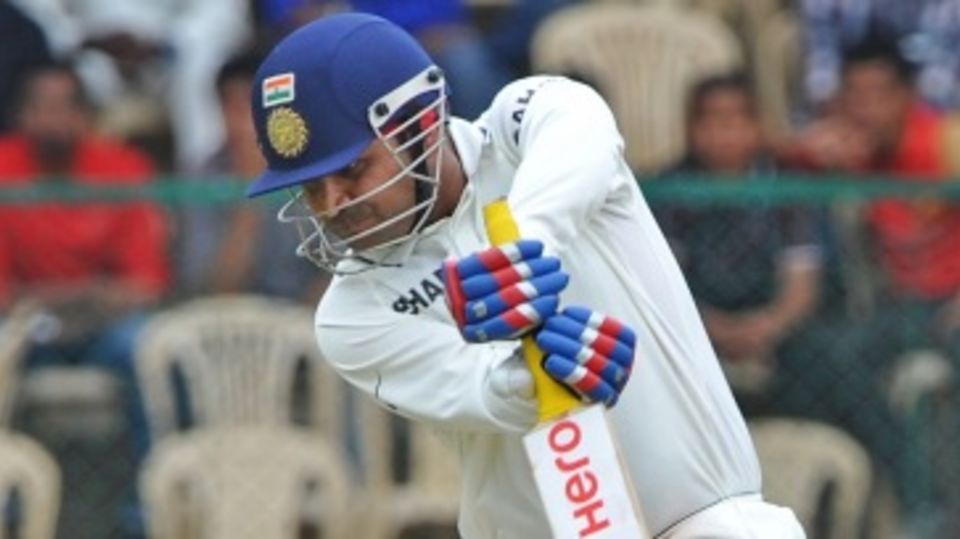 Virender Sehwag punches one through off-side