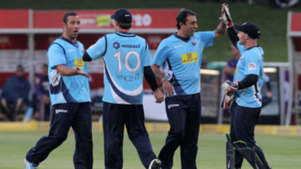 Auckland Aces celebrate a wicket