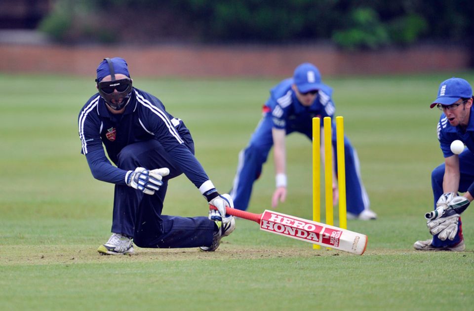Hamish MacKenzie, 42, of Australia, bats