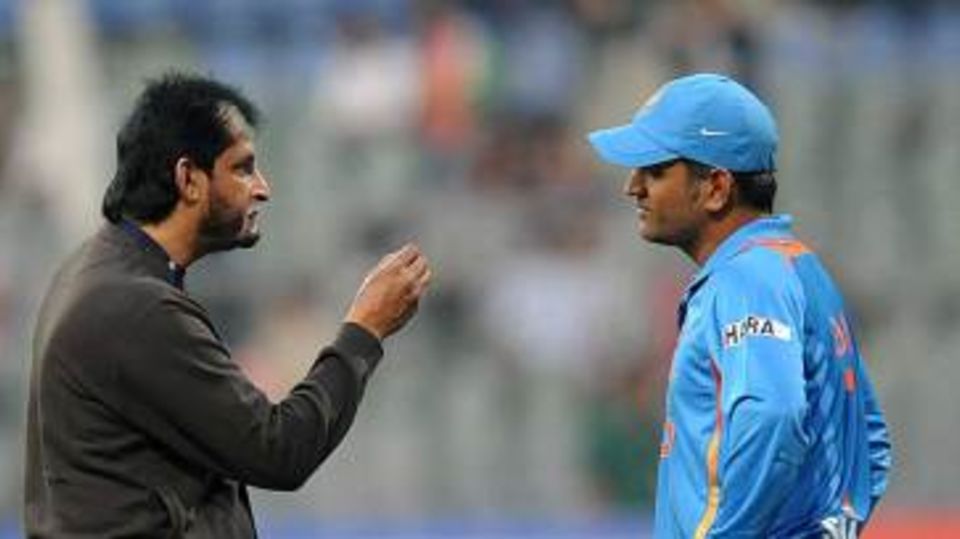 India's chairman of selectors Sandeep Patil has a word with captain MS Dhoni