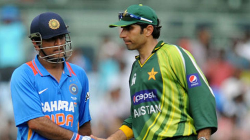MS Dhoni is congratulated by Misbah-ul-Haq after his knock of 113