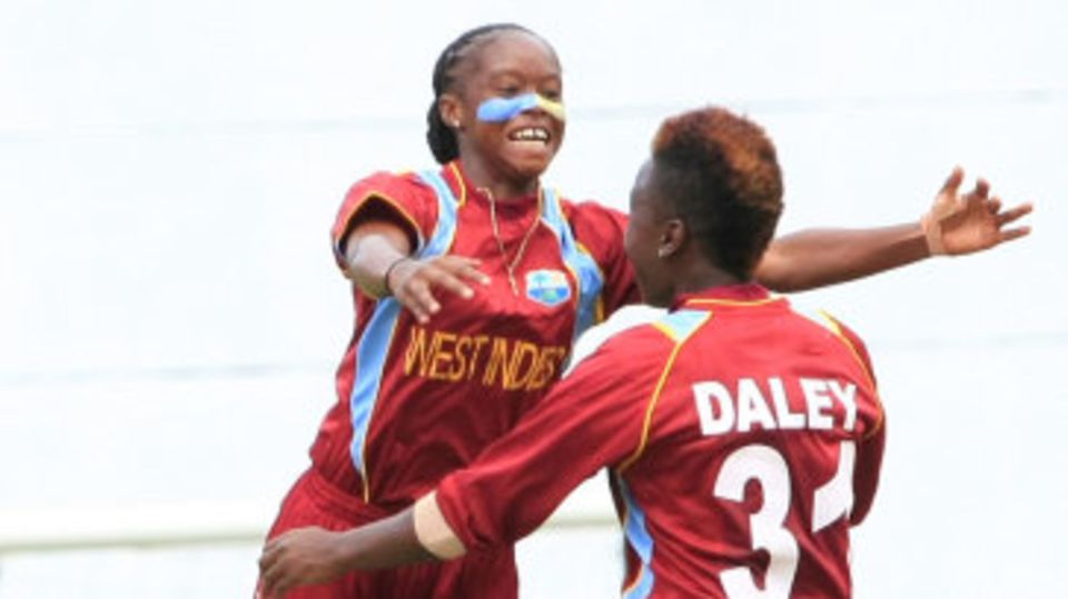 Shaquana Quintyne celebrates a wicket with Shanel Daley