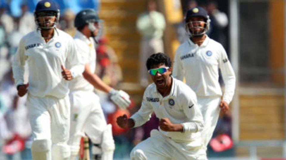 Ravindra Jadeja celebrates after taking a return catch to dismiss Moises Henriques