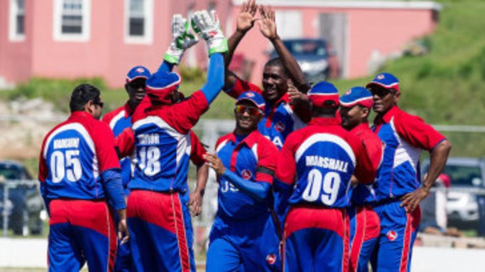 The USA team celebrate a wicket