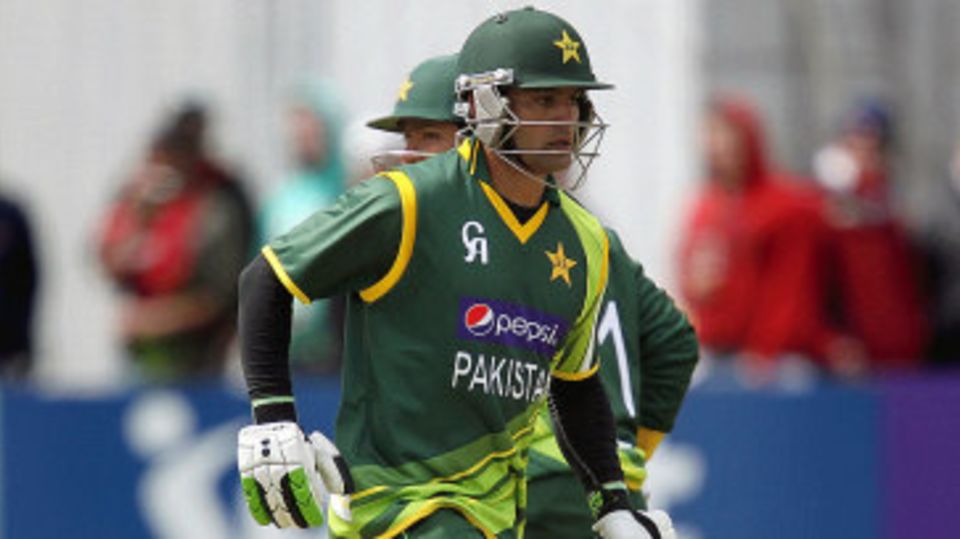 Mohammad Hafeez takes a run