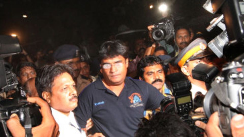 Gurunath Meiyappan with Mumbai Police after being arrested for his involvement in the IPL spot-fixing scandal