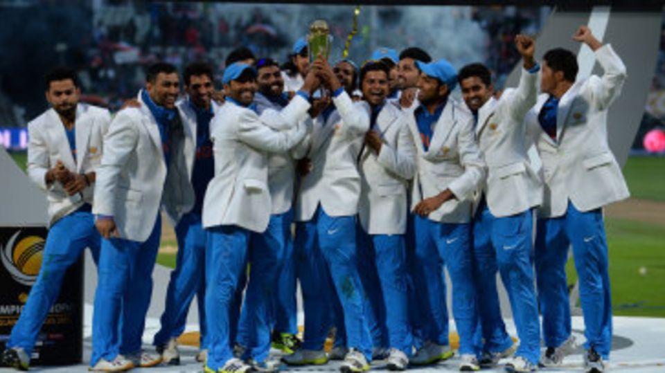 The victorious Indian team with the Champions Trophy